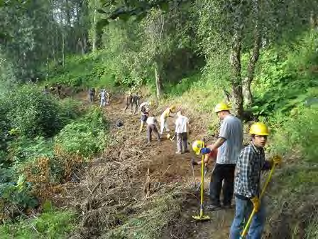 Volunteers working to create new single track trails