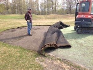 Installing new greens at Russian Jack Golf Course
