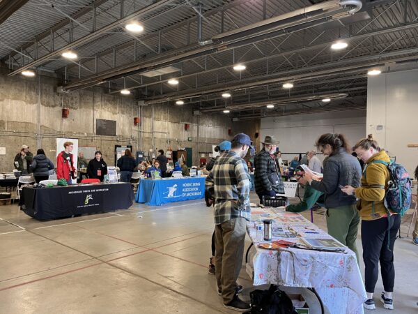people visiting booths at the Parks+Trails Recreation Fair